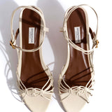 Savannah 40 Hand-Painted Crinkled Polished Goat Leather in Sand White