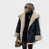 Vitória | Odinė Striukė" can be rewritten as "Vitória | Leather Jacket.