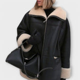 Vitória | Odinė Striukė" can be rewritten as "Vitória | Leather Jacket.