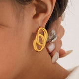 Aukso Auskarai" can be rewritten as "Gold Earrings.