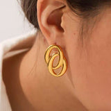 Aukso Auskarai" can be rewritten as "Gold Earrings.