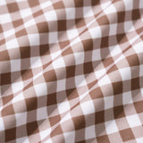 Kavos Plaid Vienos Dalies Maudymosi Kostiumas" could be rewritten as "Kavos Raštuotas Vienos Dalies Maudymosi Kostiumas.