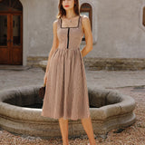 Rudas Plaid Be Rankovių Midi Suknelė" can be rewritten as "Brown Plaid Sleeveless Midi Dress.