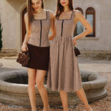 Rudas Plaid Be Rankovių Midi Suknelė" can be rewritten as "Brown Plaid Sleeveless Midi Dress.