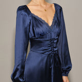 Jūrinės satino V formos raukšlėta midi suknelė" can be rewritten as "V-Neck Pleated Midi Dress in Marine Satin.