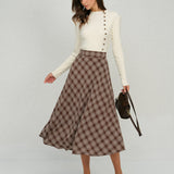 Ruda Plaid Gėlių A-Linijos Midi Sijonas" can be rewritten as "Brown Plaid Floral A-Line Midi Skirt.