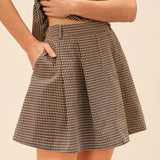 Rudas Plaid Suknelė" can be rewritten as "Brown Plaid Dress.