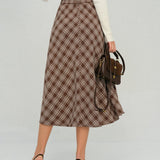 Ruda Plaid Gėlių A-Linijos Midi Sijonas" can be rewritten as "Brown Plaid Floral A-Line Midi Skirt.