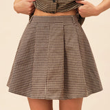 Rudas Plaid Suknelė" can be rewritten as "Brown Plaid Dress.